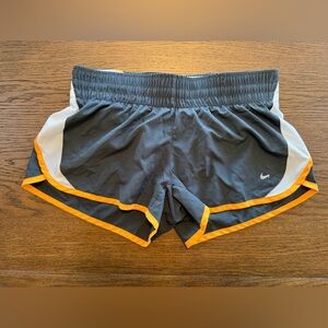Nike Women’s Charcoal Gray Athletic Shorts with Orange Trim